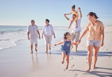 family walking on beach