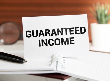guaranteed income text on paper