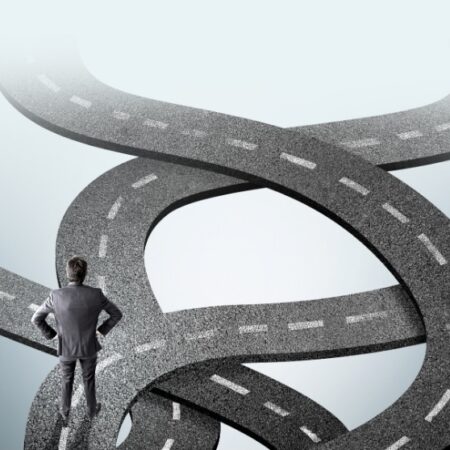 Retirement income planning decision with investments, Social Security, and annuities represented by winding roads